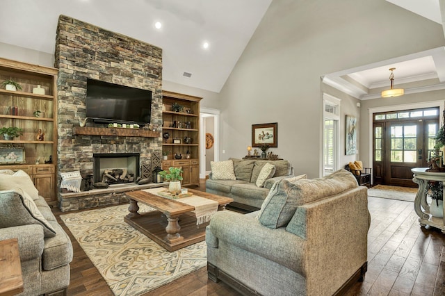 living area featuring a fireplace, dark wood finished floors, high vaulted ceiling, ornamental molding, and recessed lighting