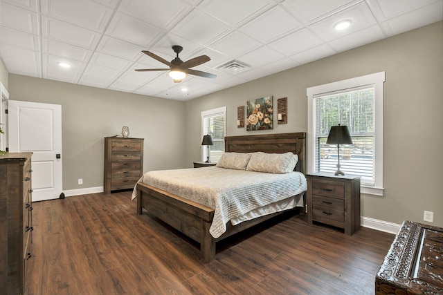 bedroom with visible vents, baseboards, ceiling fan, recessed lighting, and dark wood finished floors