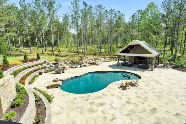 outdoor pool with a gazebo, an outdoor living space, and a patio area