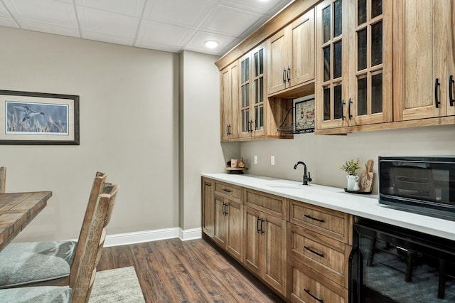 bar with wine cooler, black microwave, baseboards, dark wood-style floors, and recessed lighting