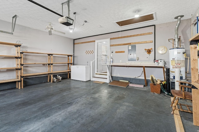 800 S Browns Ln Unit I1, Gallatin, TN 37066 - garage with fridge, a garage door opener, gas water heater, electric panel, and a workshop area