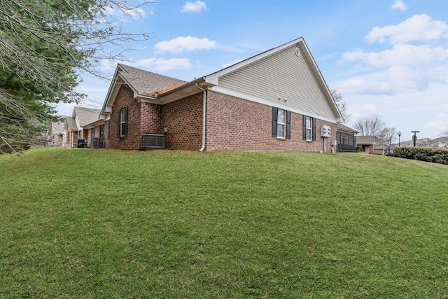 800 S Browns Ln Unit I1, Gallatin, TN 37066 - view of property exterior with a yard, brick siding, and central AC unit