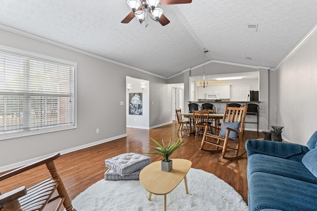 800 S Browns Ln Unit I1, Gallatin, TN 37066 - living room featuring a textured ceiling, a ceiling fan, baseboards, wood finished floors, and vaulted ceiling