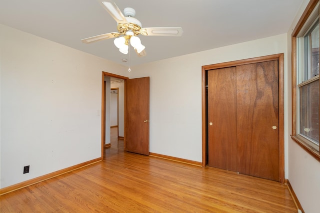 905 Crownhill Dr, Nashville, TN 37217 - unfurnished bedroom with a ceiling fan, baseboards, light wood-style flooring, and a closet