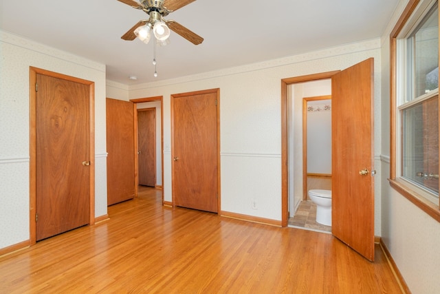 905 Crownhill Dr, Nashville, TN 37217 - unfurnished bedroom featuring baseboards, a ceiling fan, and light wood-style flooring