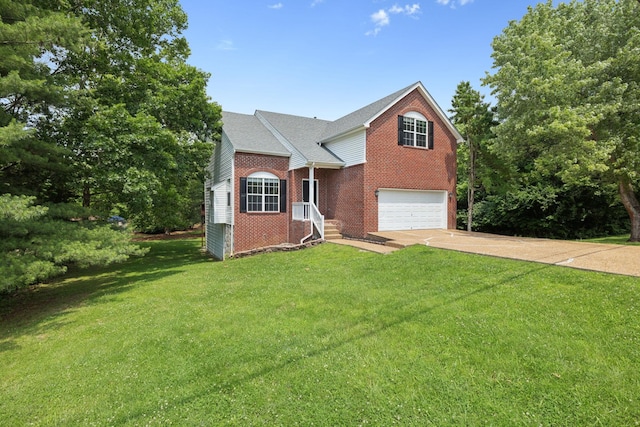2300 Devonshire Dr, Old Hickory, TN 37138 - view of front of property with a garage, brick siding, concrete driveway, and a front lawn