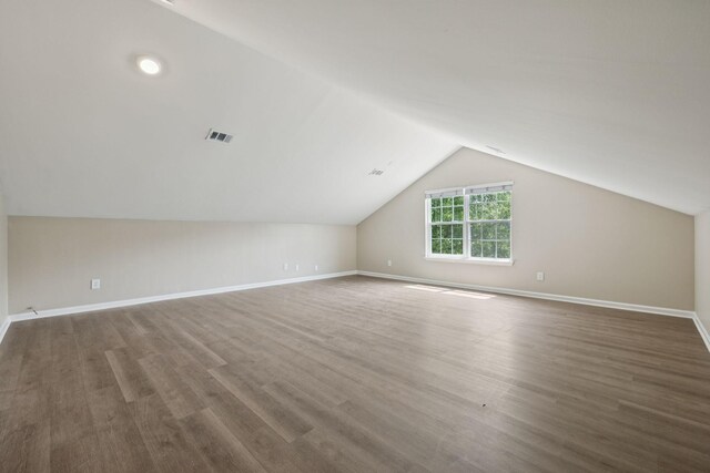 2300 Devonshire Dr, Old Hickory, TN 37138 - bonus room featuring lofted ceiling, wood finished floors, and baseboards