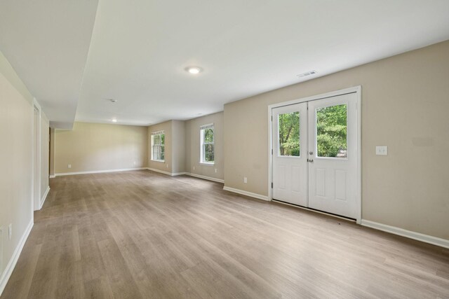 2300 Devonshire Dr, Old Hickory, TN 37138 - unfurnished living room with baseboards and light wood-type flooring