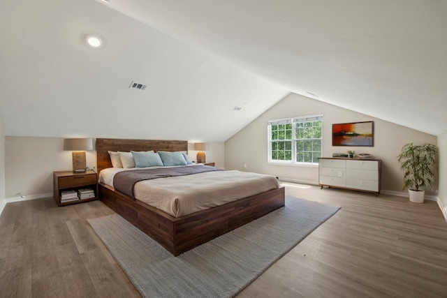 2300 Devonshire Dr, Old Hickory, TN 37138 - bedroom featuring wood finished floors, vaulted ceiling, and baseboards