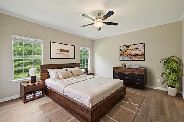 2300 Devonshire Dr, Old Hickory, TN 37138 - bedroom with baseboards, light wood-type flooring, ornamental molding, and a ceiling fan