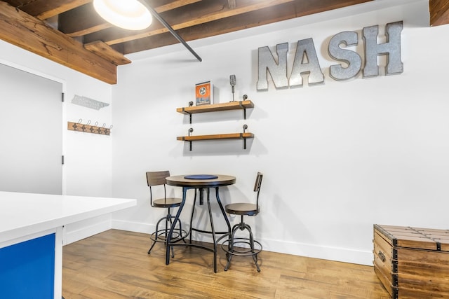 610 21st Ave N Unit 302, Nashville, TN 37203 - dining area with baseboards and wood finished floors