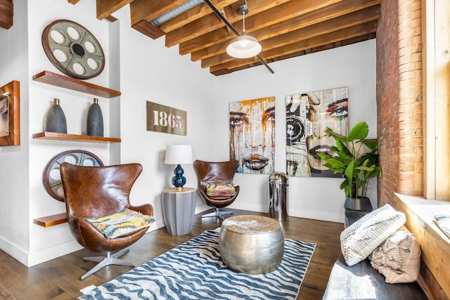 610 21st Ave N Unit 302, Nashville, TN 37203 - sitting room with baseboards, beamed ceiling, and wood finished floors