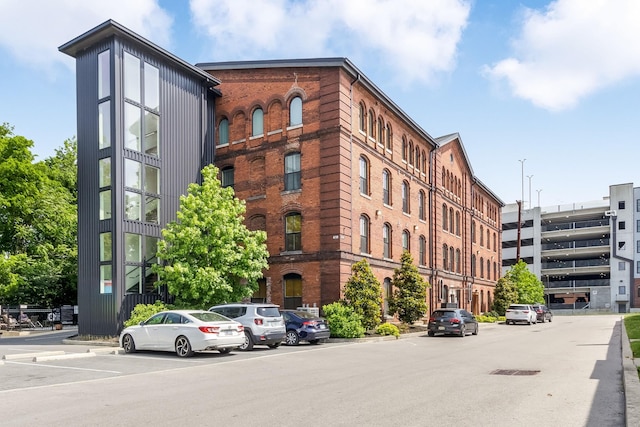 610 21st Ave N Unit 302, Nashville, TN 37203 - view of building exterior featuring uncovered parking
