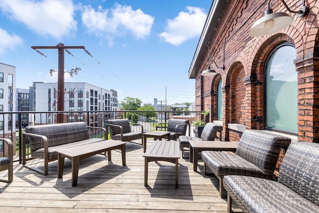 610 21st Ave N Unit 302, Nashville, TN 37203 - wooden deck featuring outdoor lounge area