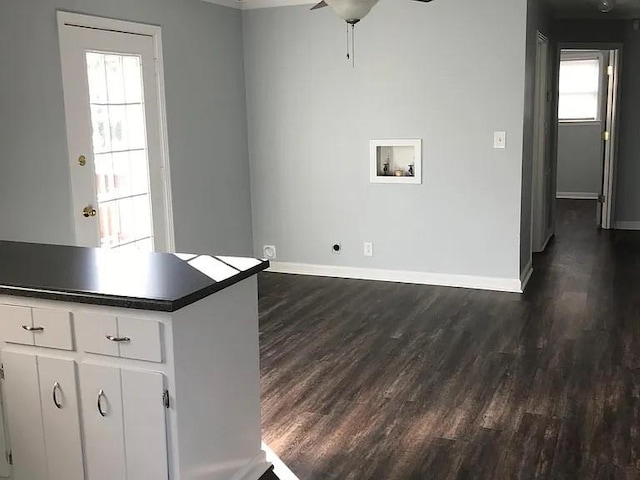 4660 Dover Rd, Indian Mound, TN 37079 - interior space featuring dark countertops, baseboards, a ceiling fan, and dark wood-style floors