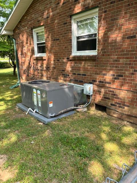 4660 Dover Rd, Indian Mound, TN 37079 - exterior details with central air condition unit and brick siding