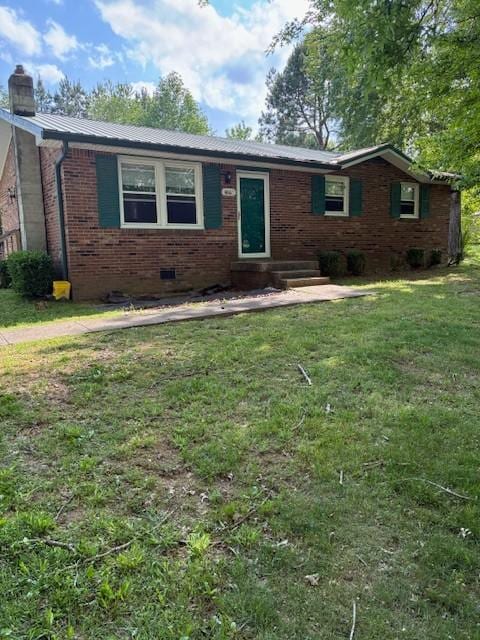 4660 Dover Rd, Indian Mound, TN 37079 - single story home with brick siding, a front lawn, crawl space, and a chimney