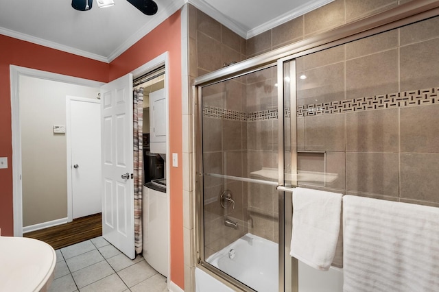 full bathroom featuring crown molding, a ceiling fan, tile patterned floors, and shower / bath combination with glass door