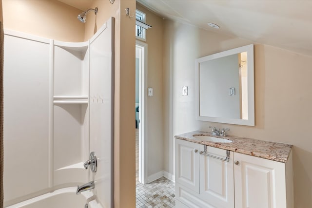 5960 Lickton Pike, Goodlettsville, TN 37072 - full bath featuring vanity, tile patterned floors, baseboards, and bathtub / shower combination