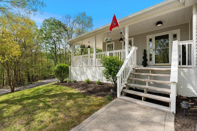 5960 Lickton Pike, Goodlettsville, TN 37072 - view of exterior entry with a yard and a porch