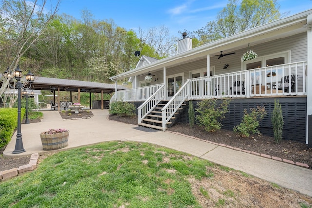 5960 Lickton Pike, Goodlettsville, TN 37072 - exterior space with a ceiling fan and a chimney