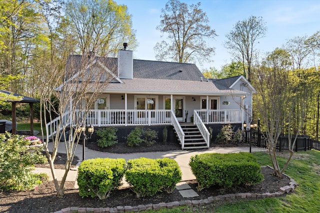 5960 Lickton Pike, Goodlettsville, TN 37072 - rear view of property featuring a chimney, a shingled roof, stairway, and a porch
