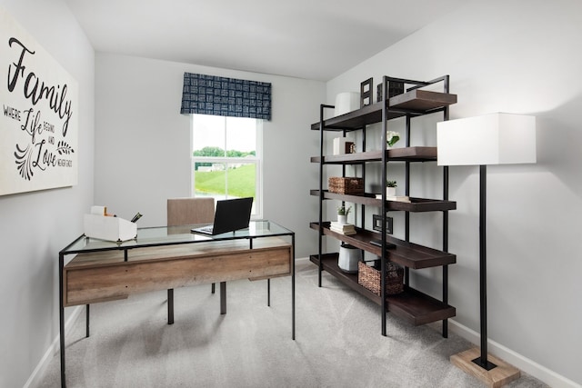 office featuring baseboards and carpet flooring