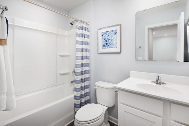 bathroom with vanity, shower / bathtub combination with curtain, and toilet