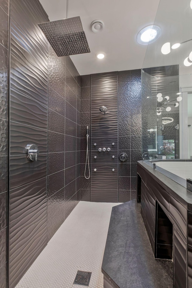 full bath featuring vanity and walk in shower