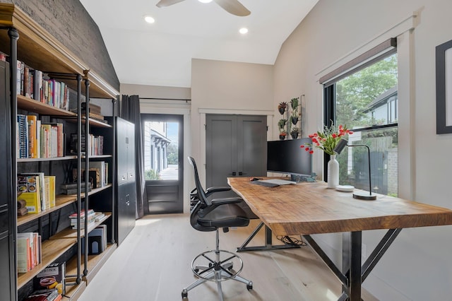 home office featuring a ceiling fan, recessed lighting, a wealth of natural light, and light wood-style flooring