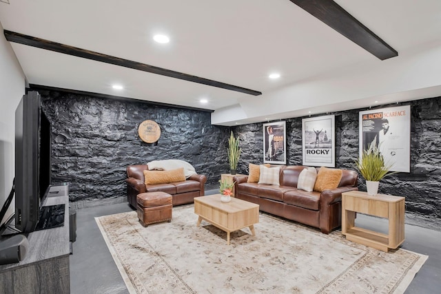 living area featuring recessed lighting and finished concrete flooring