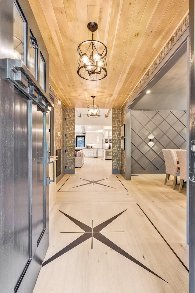 1409 Adams St, Franklin, TN 37064 - hall with wood ceiling, a chandelier, and elevator