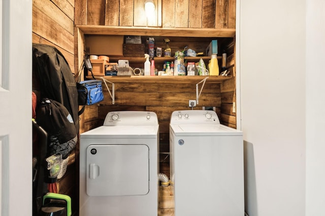 12817 Lascassas Pike, Milton, TN 37118 - clothes washing area with washing machine and clothes dryer and wood walls