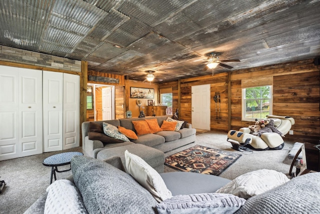 12817 Lascassas Pike, Milton, TN 37118 - living room with wooden walls, a ceiling fan, and carpet flooring