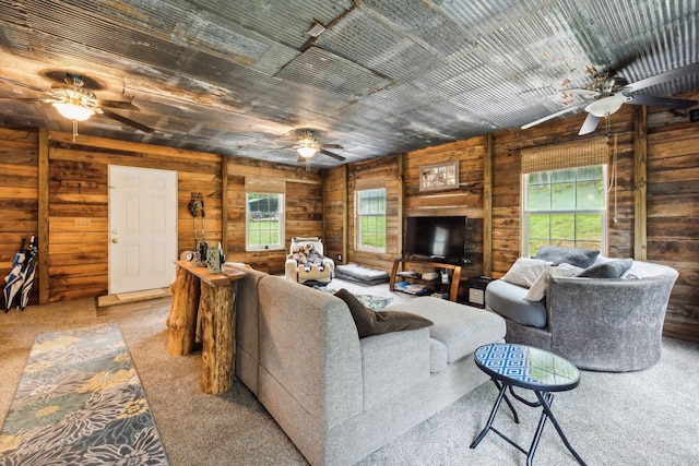 12817 Lascassas Pike, Milton, TN 37118 - living room with carpet flooring, wooden walls, and ceiling fan