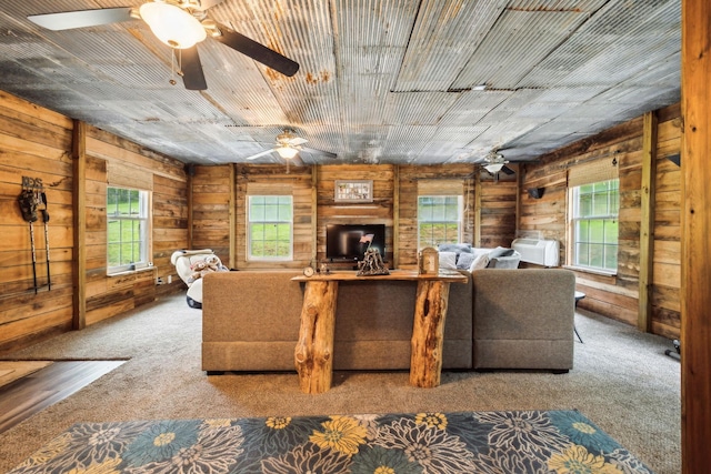 12817 Lascassas Pike, Milton, TN 37118 - carpeted living area with ceiling fan and wooden walls