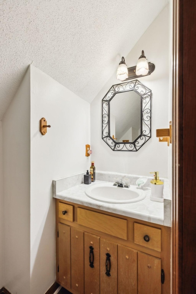 12817 Lascassas Pike, Milton, TN 37118 - bathroom featuring vanity, a textured ceiling, and lofted ceiling