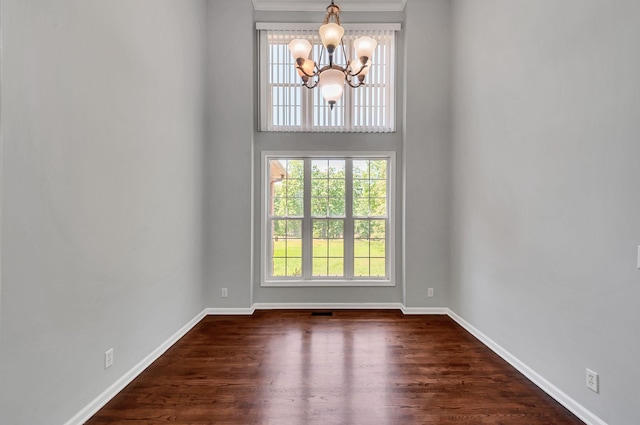 1031 Laurel Hill Dr, Dickson, TN 37055 - unfurnished room with a chandelier, dark wood-type flooring, and baseboards