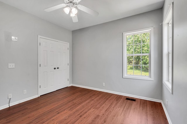 1031 Laurel Hill Dr, Dickson, TN 37055 - unfurnished bedroom with wood finished floors, baseboards, and ceiling fan