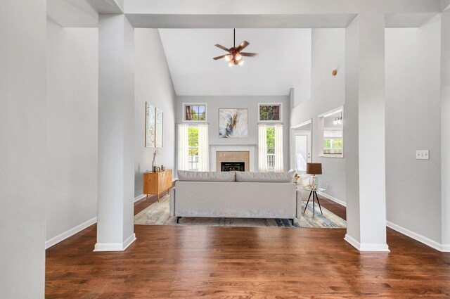 1031 Laurel Hill Dr, Dickson, TN 37055 - living area featuring high vaulted ceiling, a ceiling fan, baseboards, wood finished floors, and a fireplace