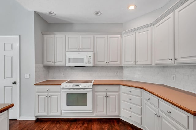 1031 Laurel Hill Dr, Dickson, TN 37055 - kitchen featuring white appliances, dark wood-style flooring, decorative backsplash, and white cabinets