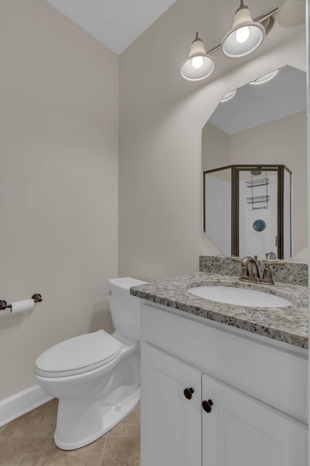 1020 Rural Plains Cir, Franklin, TN 37064 - bathroom with vanity, toilet, baseboards, tile patterned floors, and a shower stall