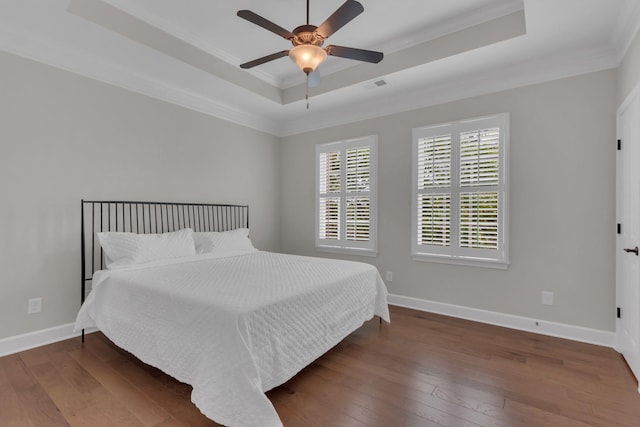 1020 Rural Plains Cir, Franklin, TN 37064 - bedroom with crown molding, a raised ceiling, and wood-type flooring