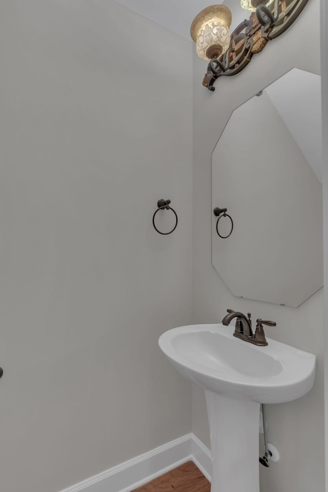 1020 Rural Plains Cir, Franklin, TN 37064 - bathroom with baseboards and wood finished floors