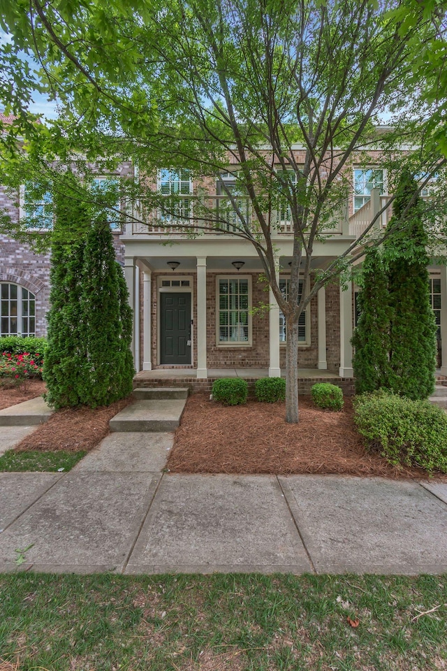 1020 Rural Plains Cir, Franklin, TN 37064 - view of front of house featuring a porch and brick siding