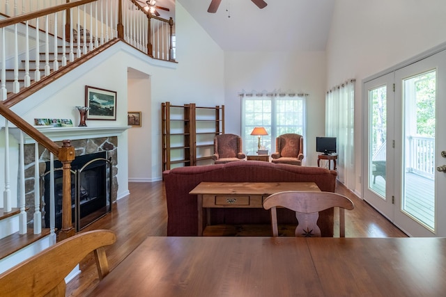 living area featuring high vaulted ceiling, ceiling fan, and a wealth of natural light