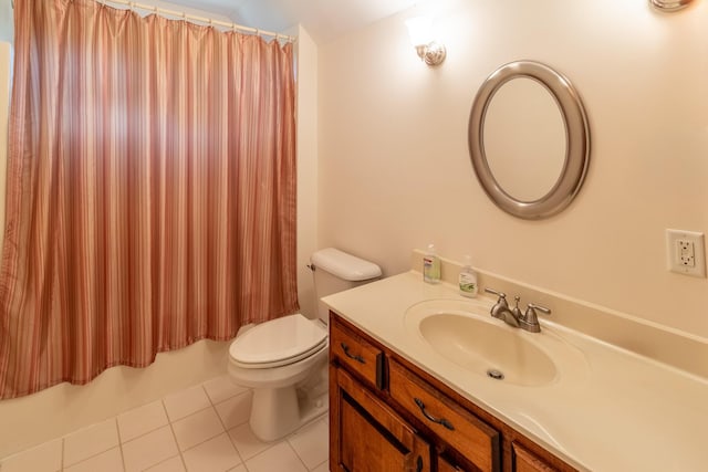 bathroom with tile patterned flooring, shower / tub combo, toilet, and vanity