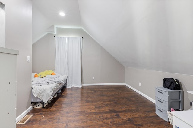 bedroom featuring visible vents, wood finished floors, baseboards, recessed lighting, and vaulted ceiling