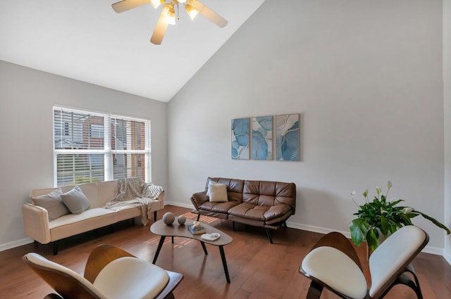 living room with high vaulted ceiling, baseboards, a ceiling fan, and wood finished floors