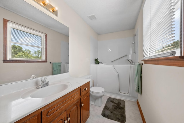757 Acorn Dr, Clarksville, TN 37043 - full bath with visible vents, vanity, toilet, baseboards, and walk in shower